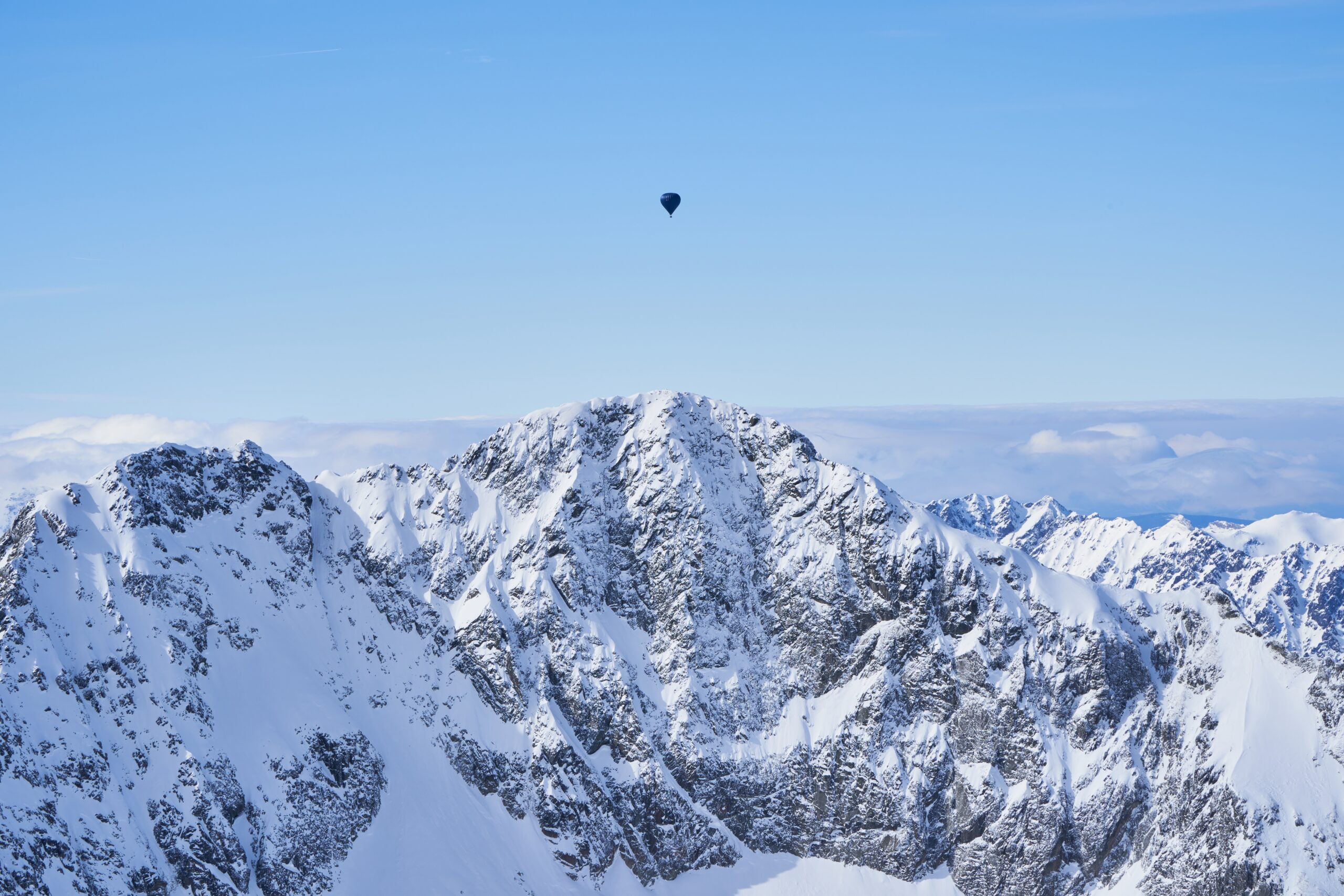 high-tatra-mountains-and-hot-air-balloon-2023-11-27-04-59-30-utc-scaled